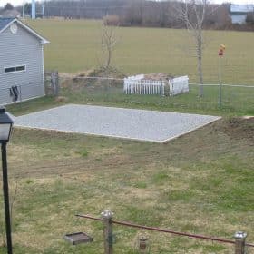Gravel base for a storage building
