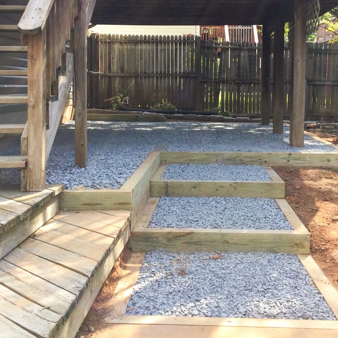 photo of a great quality gravel pad underneath a deck