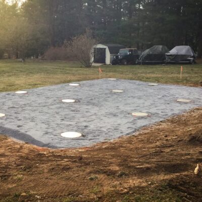 Shed foundation piers with a gravel or stone dust pad