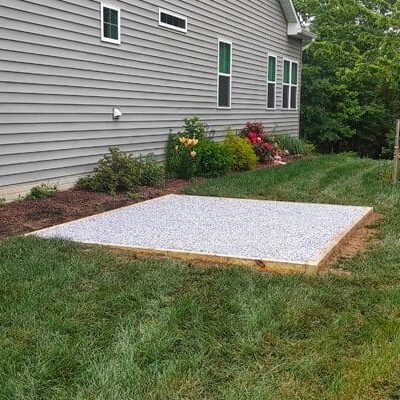 A gravel shed foundation installed in Maryland
