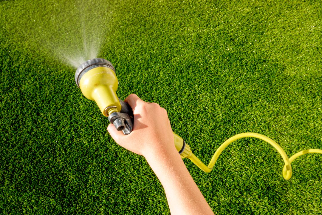 how to clean artificial grass
