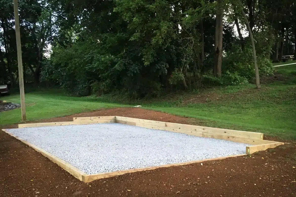 Gravel ground preparation for a shed on a slope