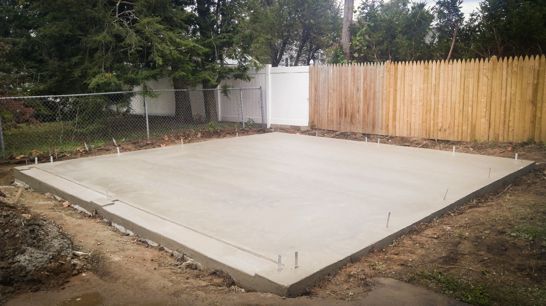 Foundation Contractor In Wilmington, DE Concrete pad shed footing with anchors