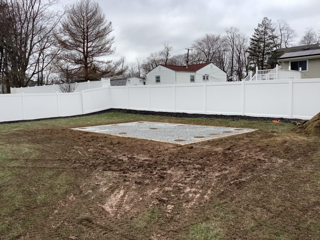 A gravel and concrete piers shed foundation in Hazlet NJ