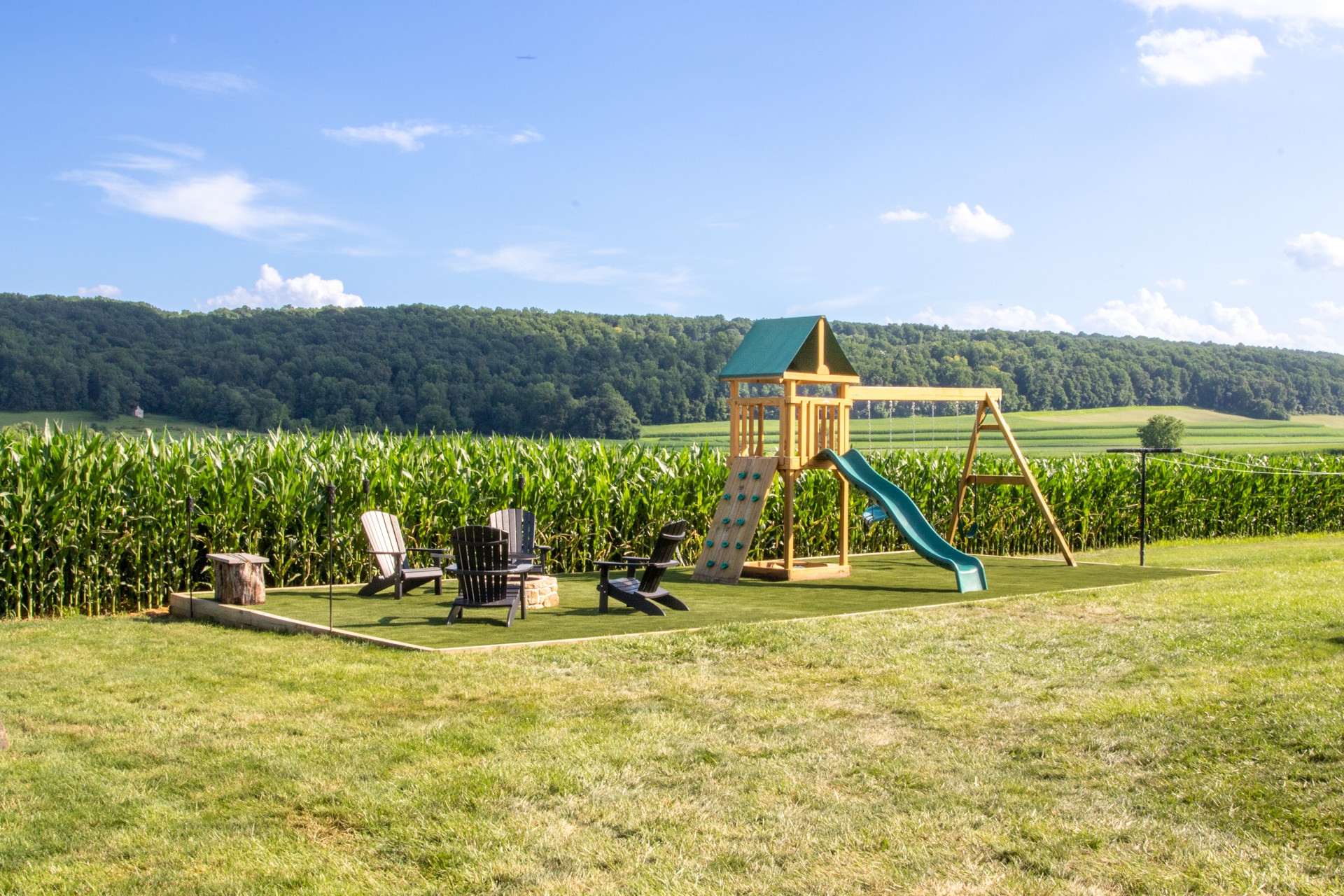 swingset on pad after artificial grass installation for ground prep for shed page