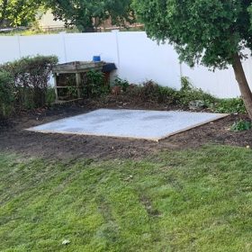 A gravel foundation for a shed